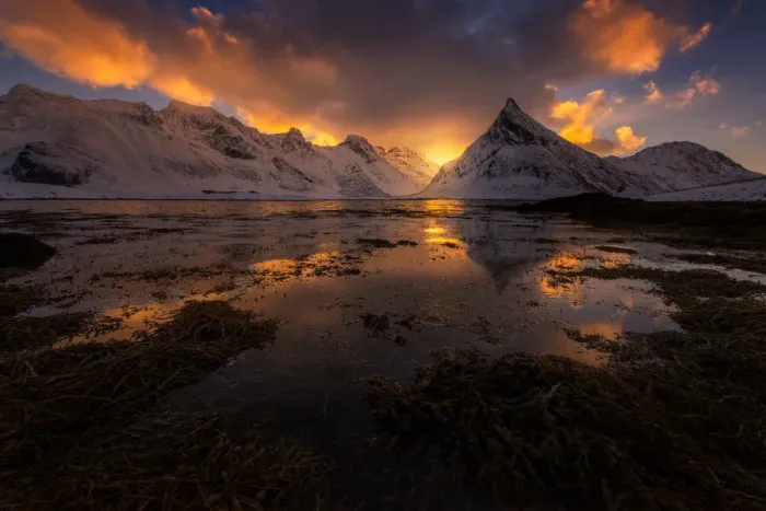 Framed Print : Sunrise over lofoten snow mountain peaks