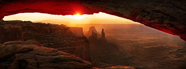 Sunrise at Mesa Arch stone arch, Canyonlands National Park, near Moab, Utah, United States