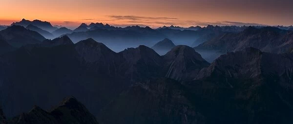 Sunrise above the peaks of the Allgau Alps in steplike arrangement, Oberstdorf, Bavaria, Germany