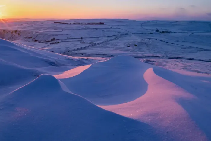 Framed Print : Sunrise over snow drifts in the English Peak District. UK Framed Print : Sunrise over snow drifts in the English Peak District. UK