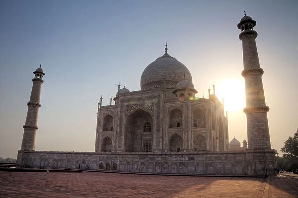 Sunrise behind Taj Mahal