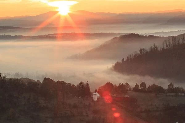 Sunrise above valley, Targu Lapus, Maramures County, Transylvania, Romania