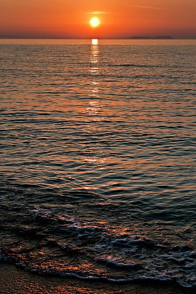 Sunset at Almyros Beach, near Acharavi, north coast, Corfu Island, Ionian Islands, Greece, Southern Europe, Europe
