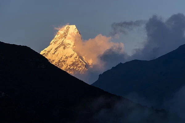 Sunset at Ama Dablam mountain peak, Everest region