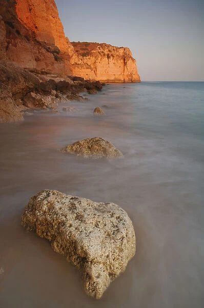 Sunset on the beach in Lagos, Algarve, Portugal, Europe