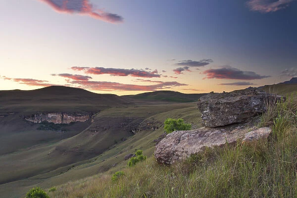 Sunset over Drakensberg mountains with orange, pink and blue - Giants Castle South Africa