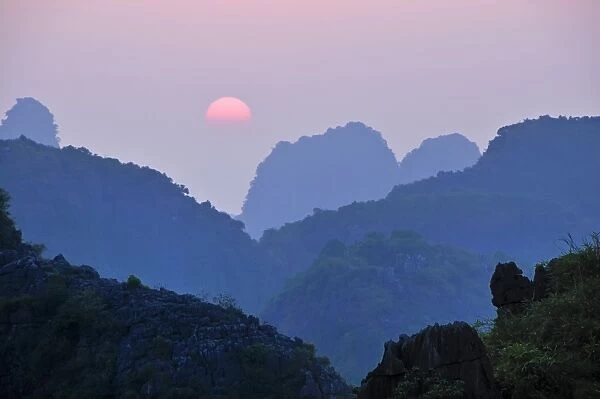 Sunset in the dry Halong Bay, Ninh Binh area, Vietnam, Southeast Asia