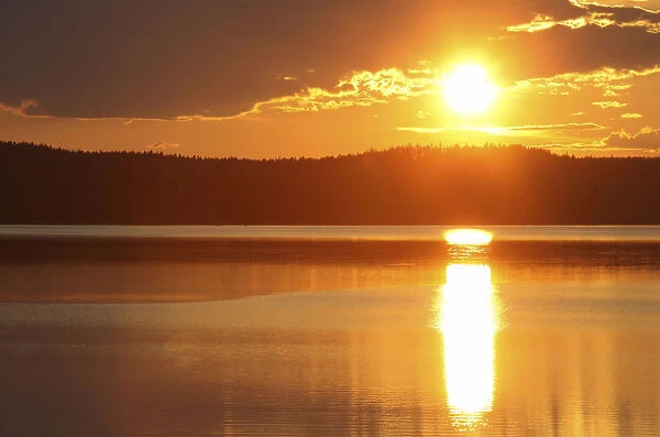 Sunset on a lake in the Kvikkjokk National Park, Lapland, Sweden