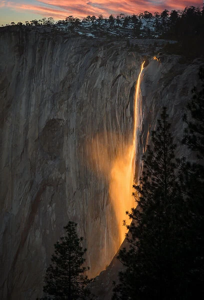 Sunset play with the reflection on waterfall at Yosemite National Park