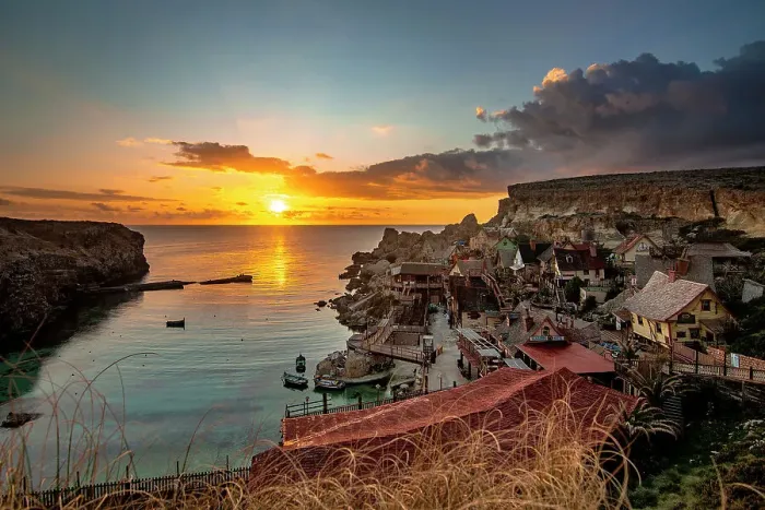 Framed Print : Sunset over Popeye Village, limits of Mellieha, Malta Framed Print : Sunset over Popeye Village, limits of Mellieha, Malta