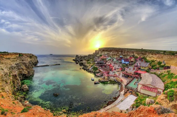 Framed Print : Sunset over popeye village on the Western coast of Malta Framed Print : Sunset over popeye village on the Western coast of Malta
