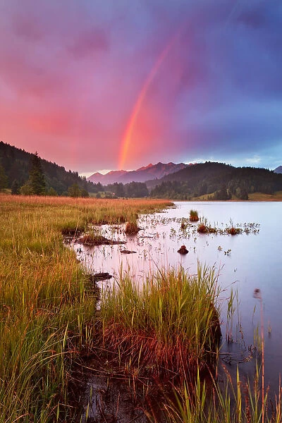 Sunset rainbow in German Alps