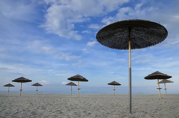 Sunshades on the beach, near Bastia, Corsica, France