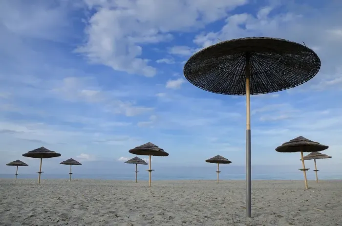 Framed Print : Sunshades on the beach, near Bastia, Corsica, France