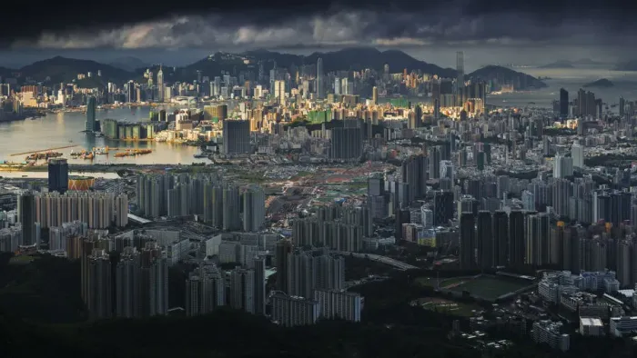 Framed Print : Sunshine over cloudy Hong Kong City Framed Print : Sunshine over cloudy Hong Kong City