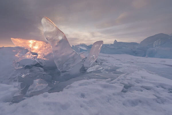 sunshine through the fin-shape Iceberg at lake baikal