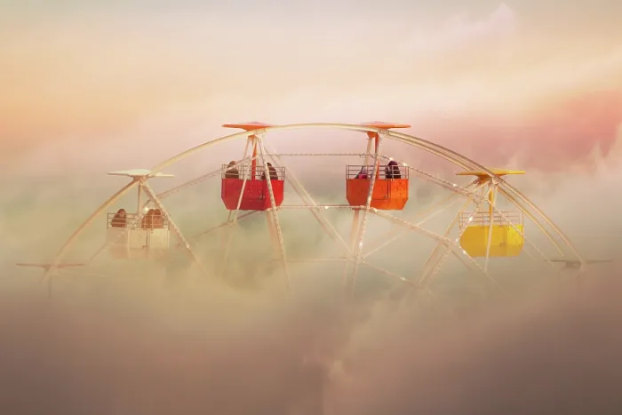 Framed Print : Surreal picture of colorful ferris wheel emerging from the clouds Framed Print : Surreal picture of colorful ferris wheel emerging from the clouds