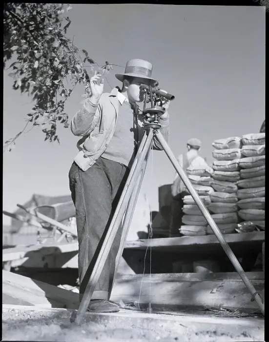 Framed Print : Surveyor Looking Through Instrument Framed Print : Surveyor Looking Through Instrument