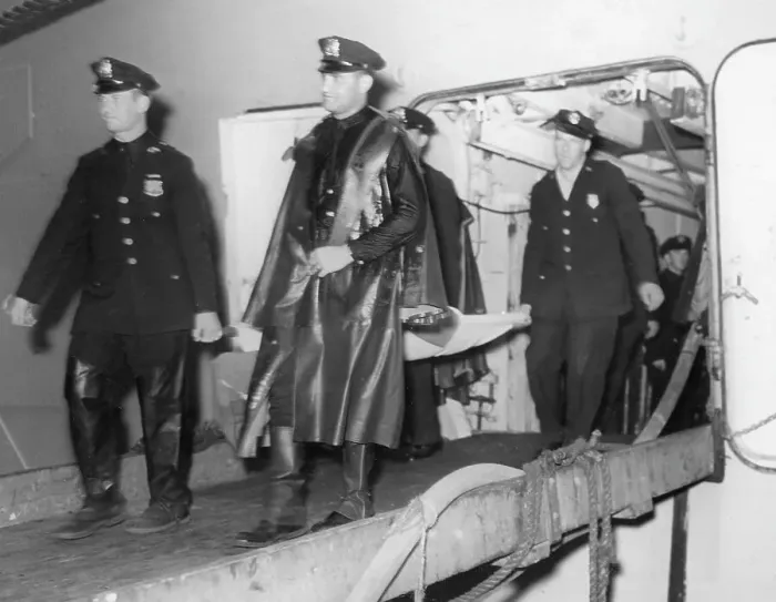 Framed Print : Survivor Carried On Stretcher