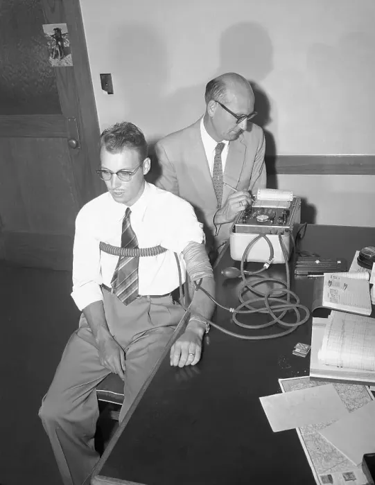 Framed Print : Suspect Getting His Lie Detection Test Framed Print : Suspect Getting His Lie Detection Test