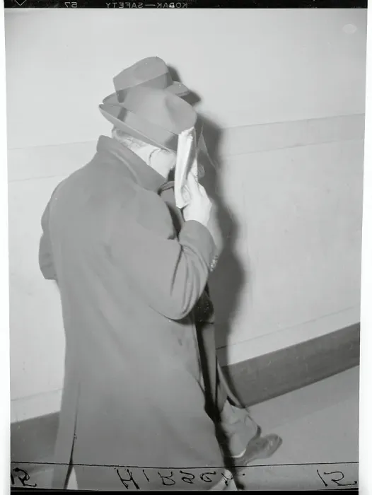 Framed Print : Suspect Mickey Bowers Hiding His Face