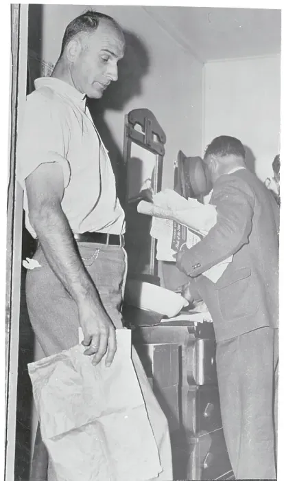 Framed Print : Suspect Paul Huissel with Authorities Searching His Cabin Framed Print : Suspect Paul Huissel with Authorities Searching His Cabin