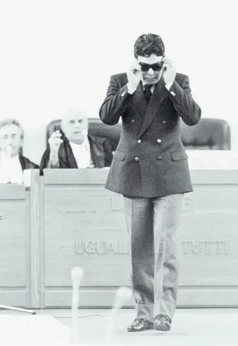 Framed Print : Suspect Tommaso Buscetta Adjusting His Eyeglasses in Court Framed Print : Suspect Tommaso Buscetta Adjusting His Eyeglasses in Court