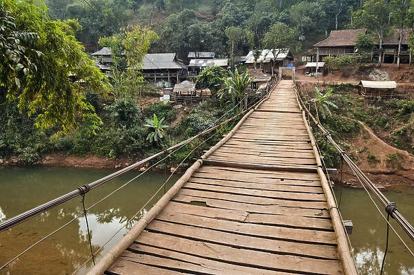 Suspension bridge leading to a village, Mai Chau valley, Northern Vietnam, Vietnam, Asia