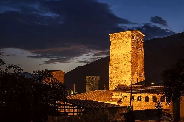 Svan towers illuminated at night. Svaneti, Georgia