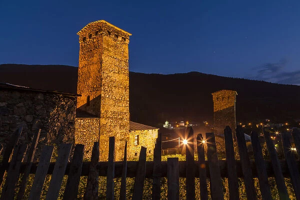 Svan towers illuminated at night. Svaneti, Georgia