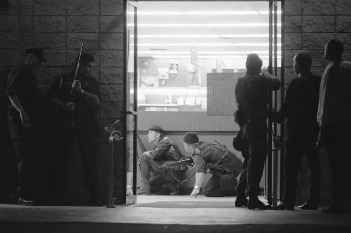 Framed Print : SWAT Team Crouching Behind Counter Framed Print : SWAT Team Crouching Behind Counter