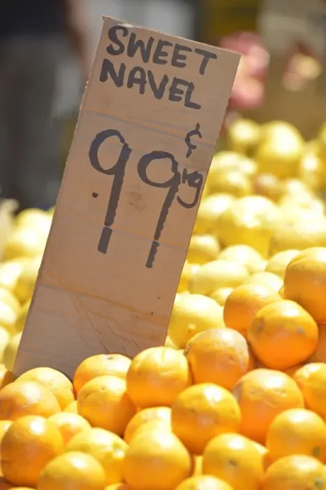 Framed Print : Sweet Navel oranges with a price tag Framed Print : Sweet Navel oranges with a price tag
