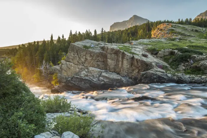 Framed Print : Swiftcurrent Falls stream at sunrise, Glacier National Park, Montana, USA