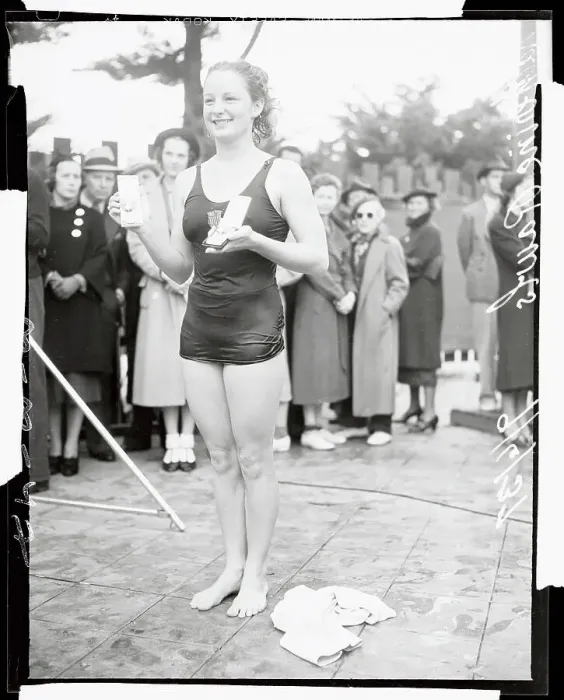 Framed Print : Swimmer Katherine Rawls Displaying Medals