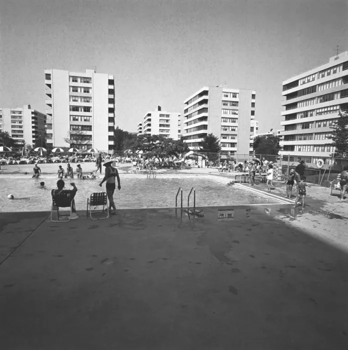 Framed Print : Swimming pool surrounded by apartment buildings, (B&W) Framed Print : Swimming pool surrounded by apartment buildings, (B&W)