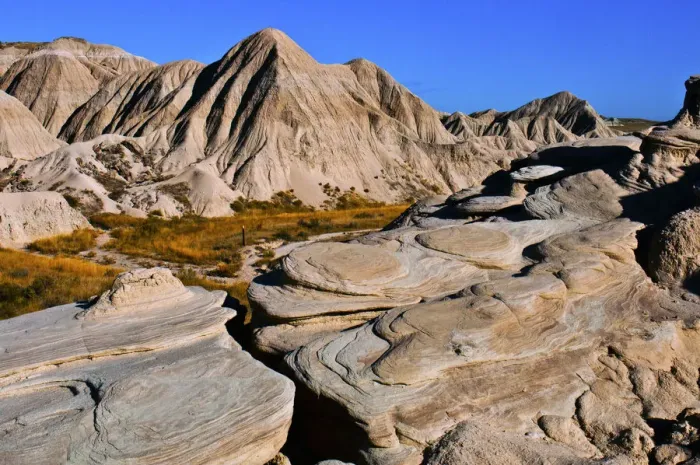 Framed Print : Swirling rock patterns at Toadstool Geologic Park, Nebraska, USA Framed Print : Swirling rock patterns at Toadstool Geologic Park, Nebraska, USA