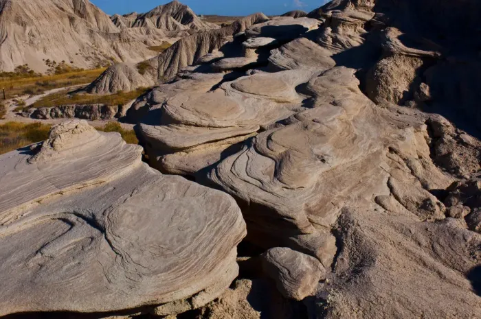 Framed Print : Swirling rock patterns at Toadstool Geologic Park, Nebraska, USA Framed Print : Swirling rock patterns at Toadstool Geologic Park, Nebraska, USA