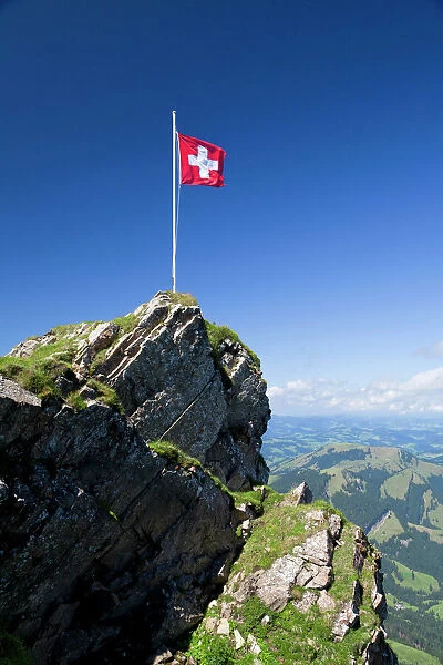 Swiss flag on a mountain in the Alpstein Range, Appenzell, Switzerland, Alps, Europe