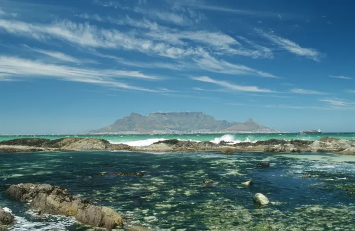 Framed Print : Table Mountain across the bay with rock pool in foreground Framed Print : Table Mountain across the bay with rock pool in foreground