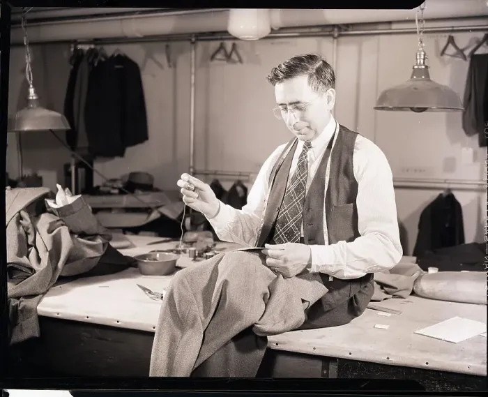 Framed Print : Tailor Sewing a Jacket Framed Print : Tailor Sewing a Jacket