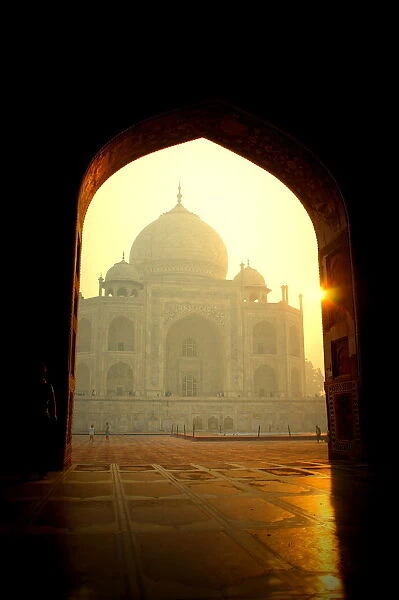 Taj Mahal at dawn through doorway