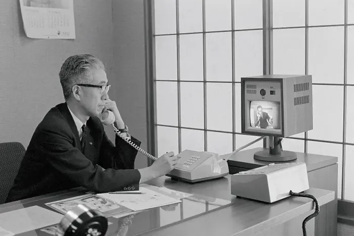 Framed Print : Talking on a Videophone