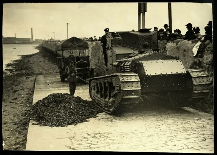 Framed Print : Tank Pulling Truck Out Of Mud Framed Print : Tank Pulling Truck Out Of Mud