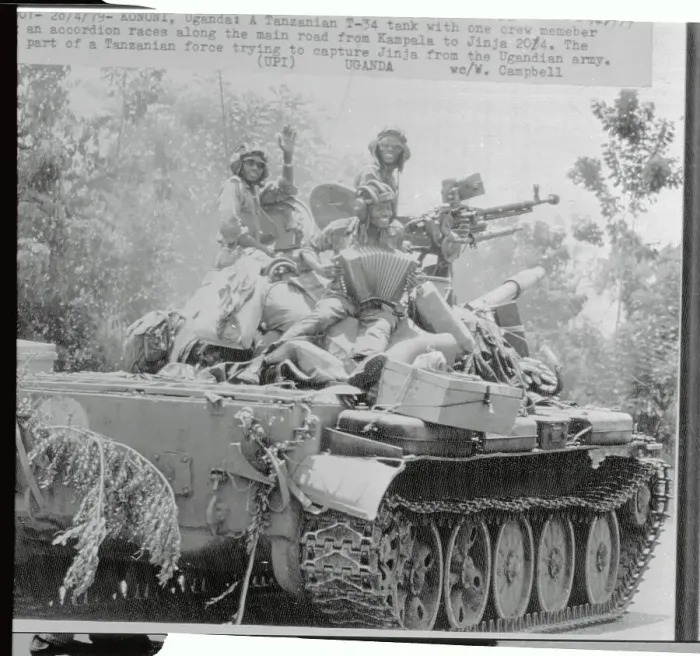 Framed Print : Tanzanian Soldiers Riding a Tank Framed Print : Tanzanian Soldiers Riding a Tank