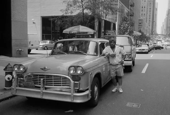 Framed Print : Taxi Driver Leaning Against Checkered Cab Framed Print : Taxi Driver Leaning Against Checkered Cab