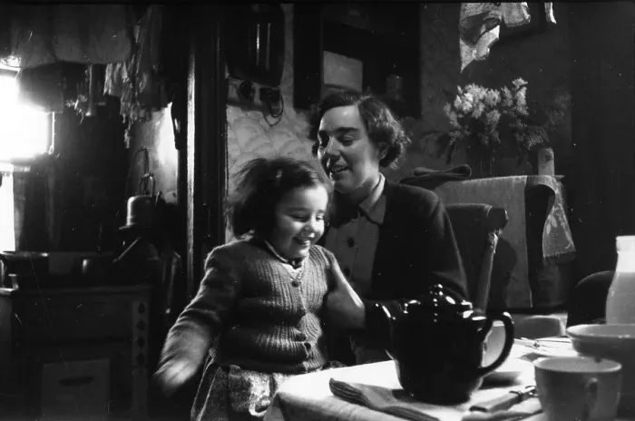 Framed Print : Tea Time. 27th December 1952: A wife and daughter wait for news of their Framed Print : Tea Time. 27th December 1952: A wife and daughter wait for news of their
