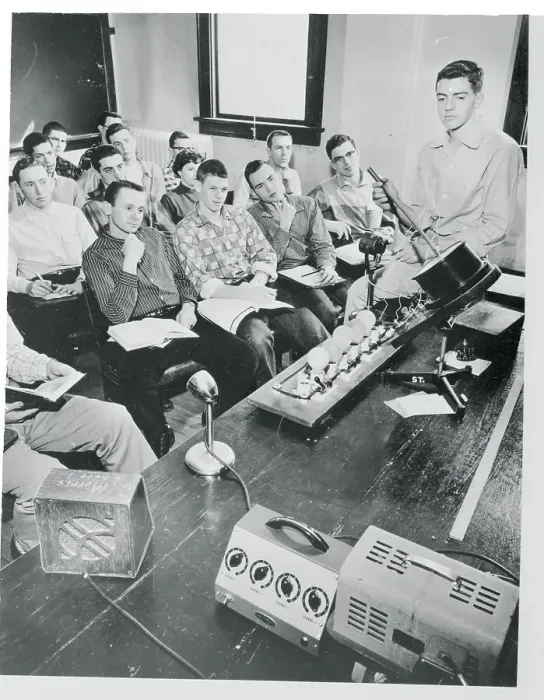 Framed Print : Teacher Conducts Course over Intercom Framed Print : Teacher Conducts Course over Intercom