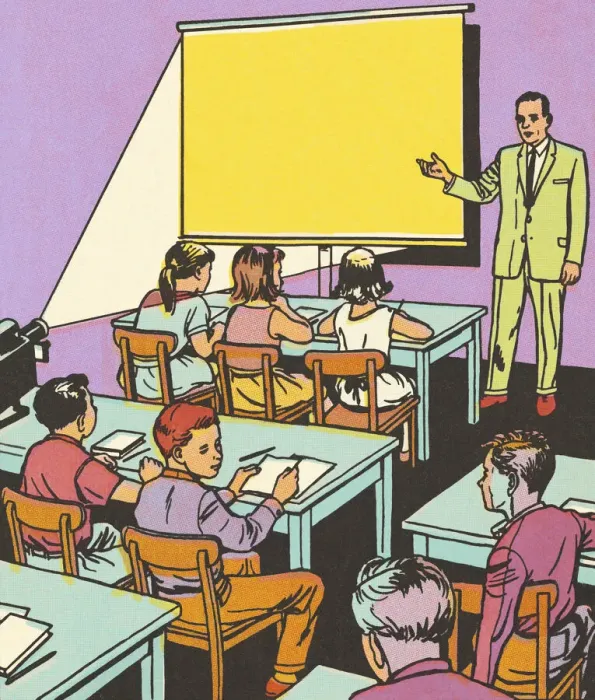 Framed Print : Teacher Showing a Film in a Classroom Framed Print : Teacher Showing a Film in a Classroom