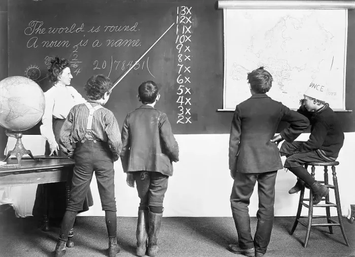 Framed Print : Teacher Showing Lesson to Students Framed Print : Teacher Showing Lesson to Students