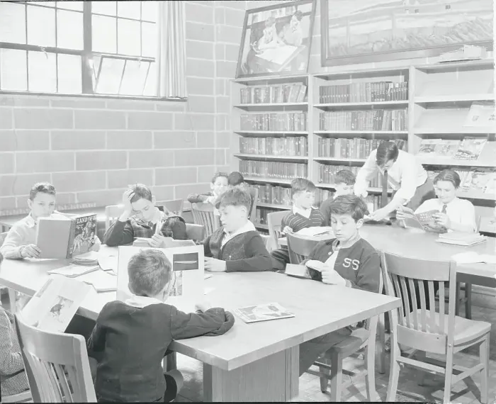 Framed Print : Teacher with Students in Library Framed Print : Teacher with Students in Library